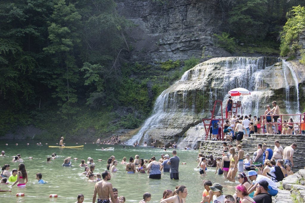 The crowd swimming at Robert H. Treman State Park