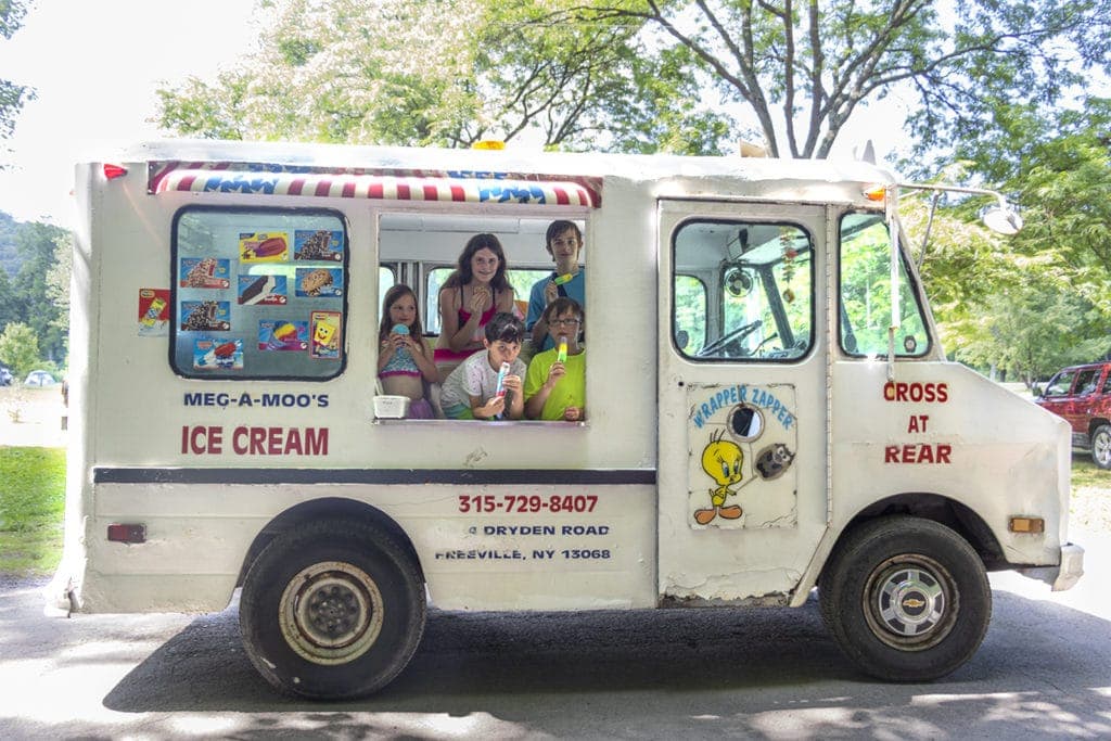 Camping in New York at Robert H. Treman State Park. The ice cream man decided to let the kids have a tour of his ice cream truck. Best Day Ever!