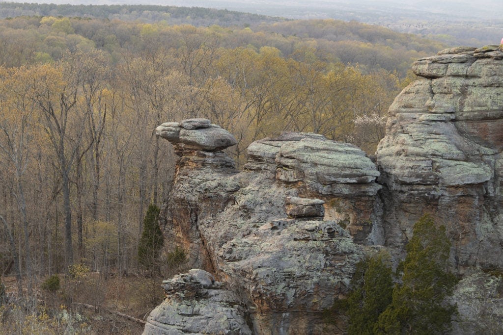 Garden of the Gods in Shawnee National Forest, Illinois - A breathtaking view of unique rock formations and towering cliffs, showcasing the natural wonders of this iconic destination in Southern Illinois. A captivating landscape surrounded by lush greenery, perfect for exploration and outdoor enthusiasts.
