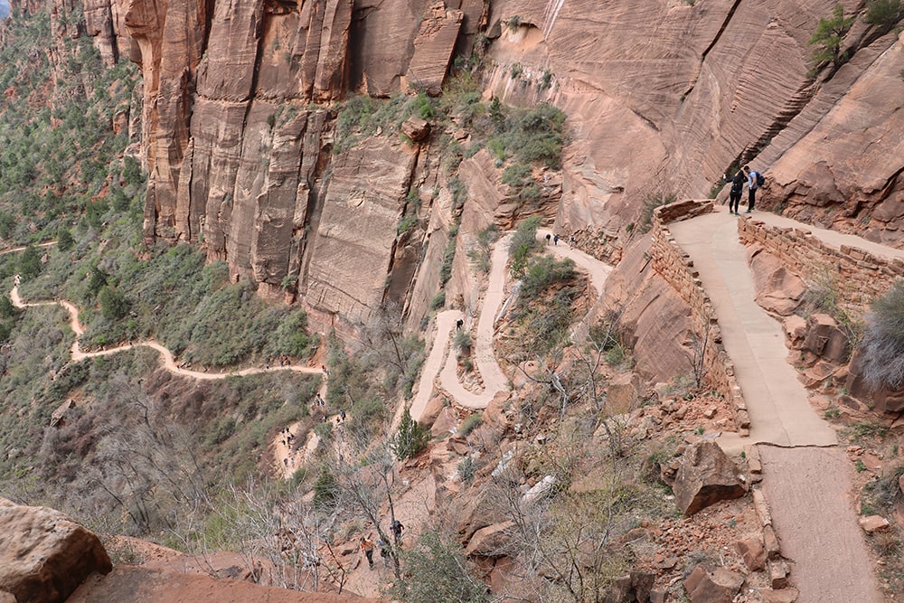 Angels Landing Switchbacks - A daring trail ascending through steep switchbacks, leading to the iconic summit with breathtaking views in Zion National Park. A thrilling hiking experience for adventure seekers amidst Utah's stunning red rock terrain.