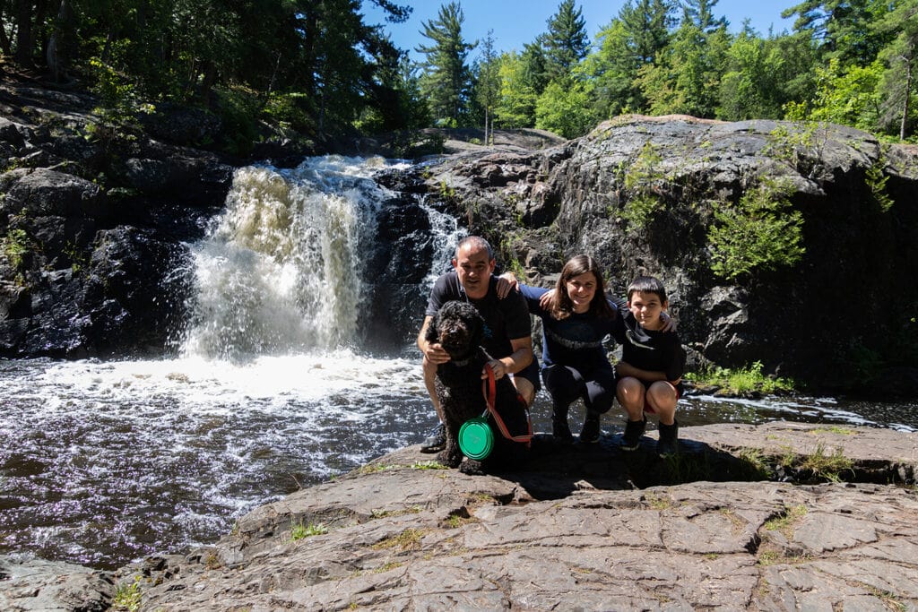 The last and final drop of Dead River Falls in Marquette. A short waterfall surrounded by rocky terrain.