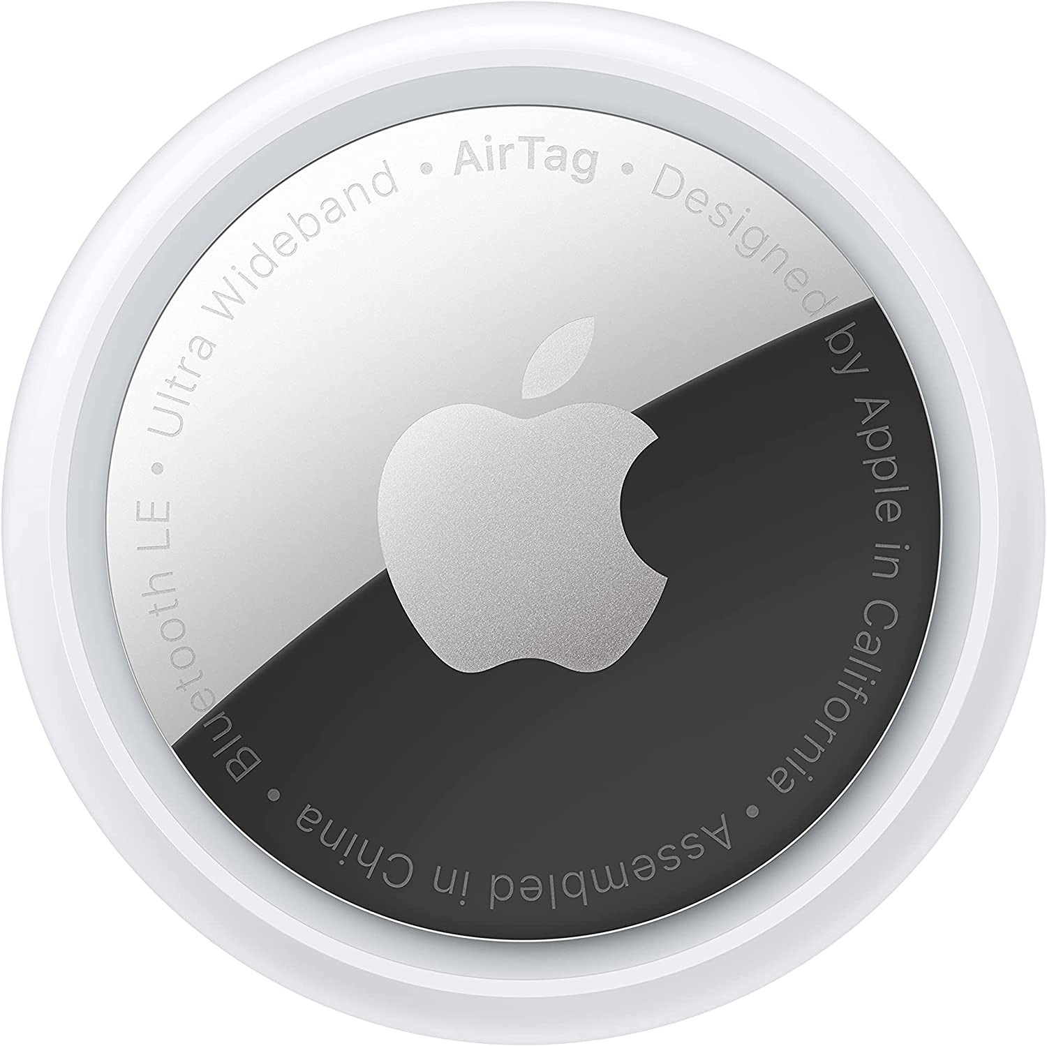 A picture of a round Apple air tag (a tracking device). Its great for tracking luggage.