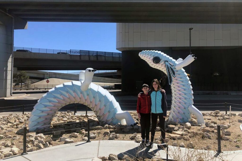 Large axolotl statue outside of Meow Wolf Denver.