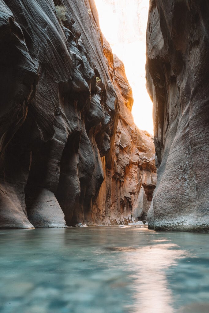 The Narrows - A captivating slot canyon in Zion National Park, characterized by towering sandstone walls and the winding Virgin River. A scenic and narrow passage offering a unique hiking experience in the heart of Utah's natural wonders.