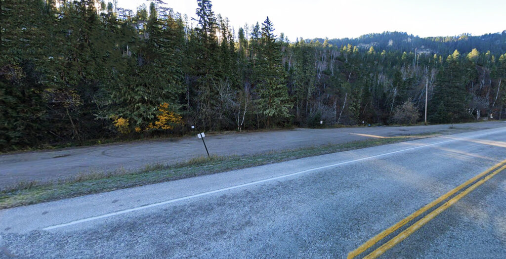 Devil's Bathtub trailhead parking lot nestled in the natural surroundings of Spearfish Canyon, South Dakota.