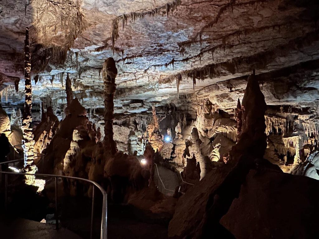 Cathedral Caverns - An enchanting view of the awe-inspiring underground chambers, stalactites, and stalagmites within Cathedral Caverns State Park. A captivating alternative destination showcasing the hidden wonders beneath the surface.